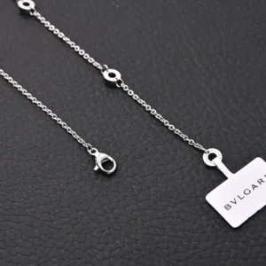 Bvlgari necklace silver chain with circular link accents and branded clasp in stainless steel material