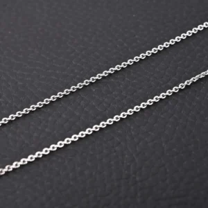 Repsgoat silver chain necklace sterling silver round link design accessory on black textured background