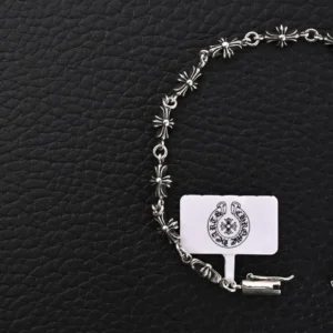 Chrome Hearts Diamond Free Fine Cross Flower Bracelet on black background, featuring floral designs and a clasp, suitable for both men and women.
