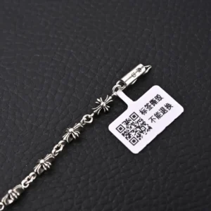 Chrome Hearts Diamond Free Fine Cross Flower Bracelet featuring a silver chain with floral designs and a tag, suitable for both men and women, priced at $69.00.