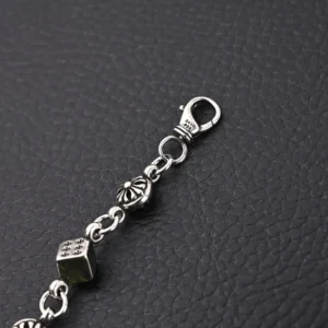 Chrome Hearts bracelet silver metal with floral and dice charms lobster clasp closure accessory