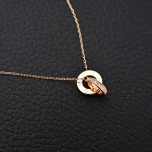 Cartier Love necklace rose gold diamond-accented pendant delicate chain accessory