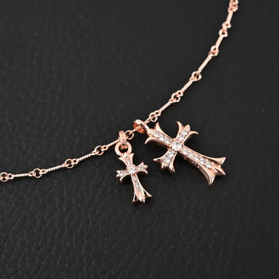 Chrome Hearts double cross pendant necklace rose gold color with crystal embellishments and delicate chain links