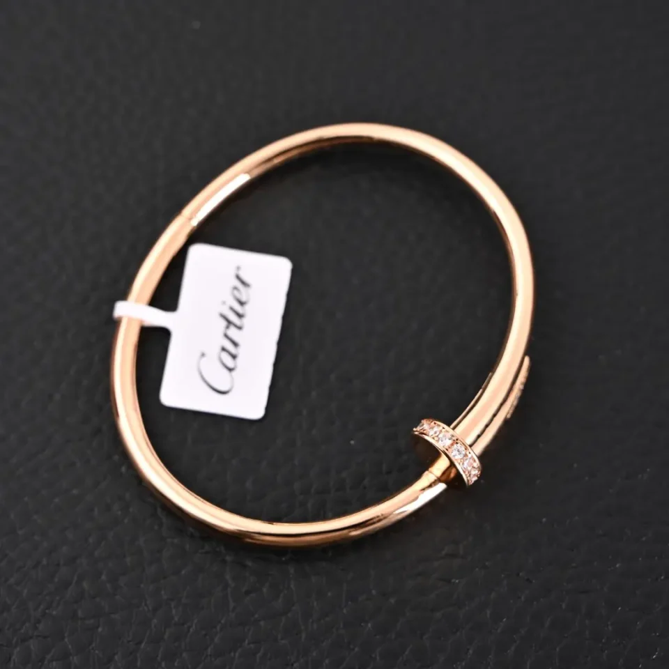 Cartier Juste un Clou bracelet rose gold with diamond pav&eacute; accent luxury accessory