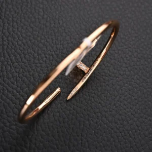 Cartier Juste un Clou bracelet rose gold diamond accents nail design jewelry accessory