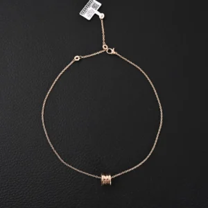Bvlgari necklace rose gold chain with triple circle pendant and lobster clasp closure