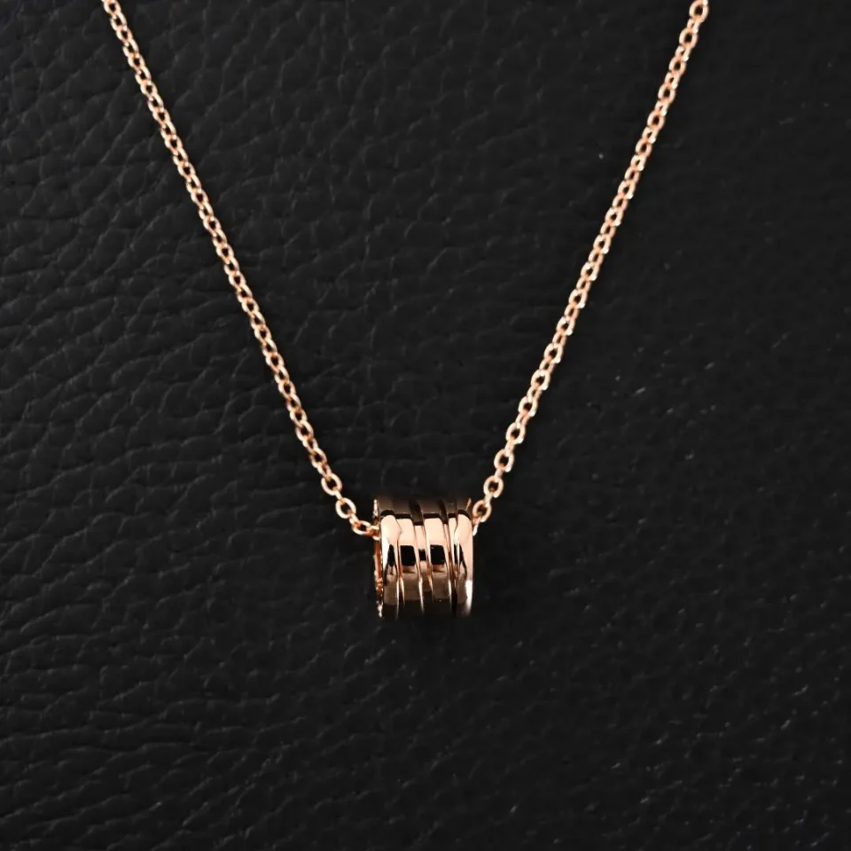 Bvlgari necklace rose gold chain with iconic coil pendant luxury jewelry accessory