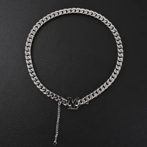 Louis Vuitton Black Enamel Cuban Silver Necklace featuring a chunky silver chain and enamel LV logo, set against a dark background, highlighting luxury and modern design.
