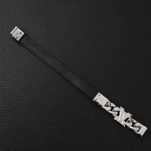 Louis Vuitton replica leather buckle bracelet with LV logo, featuring a sleek black leather band and metallic accents, ideal for luxury accessory enthusiasts.