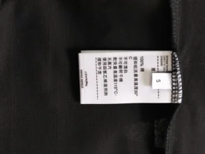 Bottega Veneta garment label small size black fabric 100% cotton care instructions tag