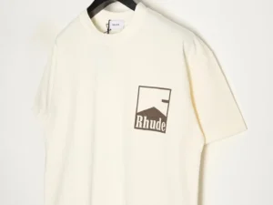 RHUDE 25ss retro logo print short-sleeved T-shirt in cream color with logo detail, featured for sale on an e-commerce fashion platform.