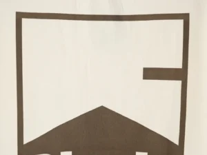 RHUDE 25ss retro logo print on a short-sleeved T-shirt, featuring a distinctive geometric design in brown and white.