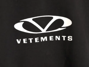 Vetements logo black textile fabric close-up accessory with white emblem print