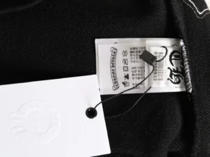 Chrome Hearts clothing tag black fabric cotton material with white care label and embossed logo hang tag