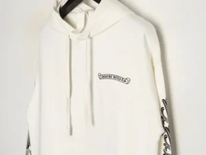 Chrome Hearts white hoodie featuring a chest logo and intricate sleeve designs, showcasing premium replica fashion details for style-conscious consumers.