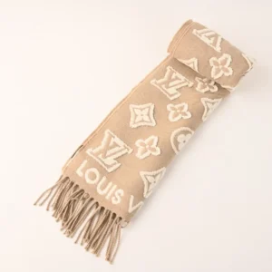 Louis Vuitton 3D Embossed Logo Wool Tassel Long Scarf in beige, featuring iconic logo patterns and fringed edges, ideal luxury accessory for both genders.