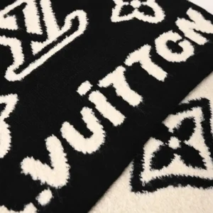 Louis Vuitton scarf black and white wool with iconic monogram pattern and logo detailing