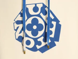 Louis Vuitton hoodie featuring a blue floral logo design and matching drawstrings, emphasizing luxury fashion replica details.