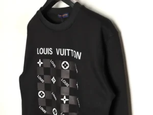 Black Louis Vuitton hoodie featuring checkered print and logo design, highlighting premium quality fabric and oversized fit.