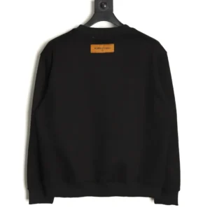Black Louis Vuitton hoodie featuring a round neck and a prominent label on the back, displayed on a hanger, emphasizing its premium quality and unisex oversized fit.