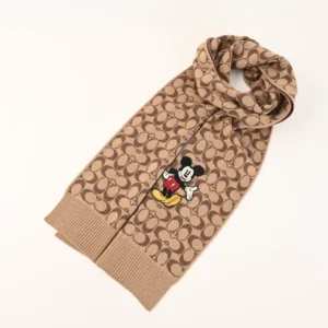 Coach Disney Double-Sided Logo Wool Scarf featuring Mickey Mouse design, soft wool and cashmere blend, ideal for warmth and style.
