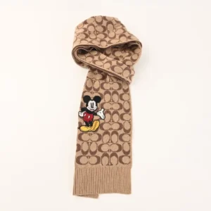 Coach Disney Double-Sided Logo Wool Scarf featuring Mickey Mouse design, soft wool and cashmere blend, ideal for warmth and comfort.