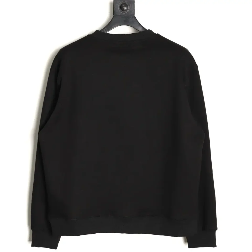 No brand or product details visible on black crewneck sweatshirt back made of cotton fabric
