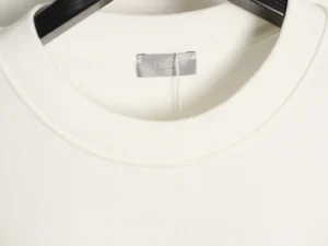 DIOR 47 letter round neck guard featuring a soft, cream-colored fabric, emphasizing luxury and comfort suitable for both men and women.