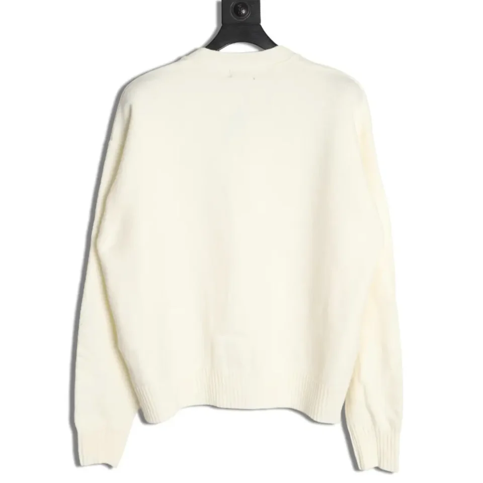 The image provided shows a sweater, but there is no visible brand, model number, or material information. Please provide these details to create an SEO-optimized alt text according to your requested format.