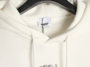 Burberry hoodie white cotton drawstring with black logo tag on hanger