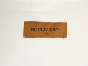Louis Vuitton label on a white hoodie, showcasing brand identity for the hot air balloon hoodie replica.