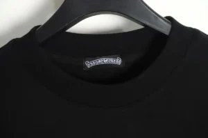 Black Chrome Hearts hoodie showcasing the neckline and label detail, emphasizing premium craftsmanship and style.