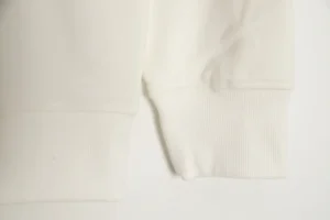 RepsGoat Long Sleeve Shirt white cotton ribbed cuffs close-up detail