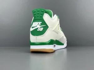 Nike Air Jordan 4 Retro OG White Pine Green suede leather sneakers with green accents and gum sole