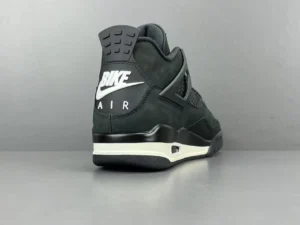 Jordan 4 RM SP Nigel Sylvester Driveway Grey sneaker with "BIKE AIR" branding on the heel, showcasing a stylish black and grey colorway, ideal for luxury sneaker enthusiasts.