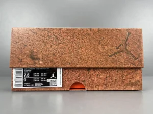 Jordan 4 RM SP Nigel Sylvester Driveway Grey sneaker box with textured design and logo, showcasing size and product details.