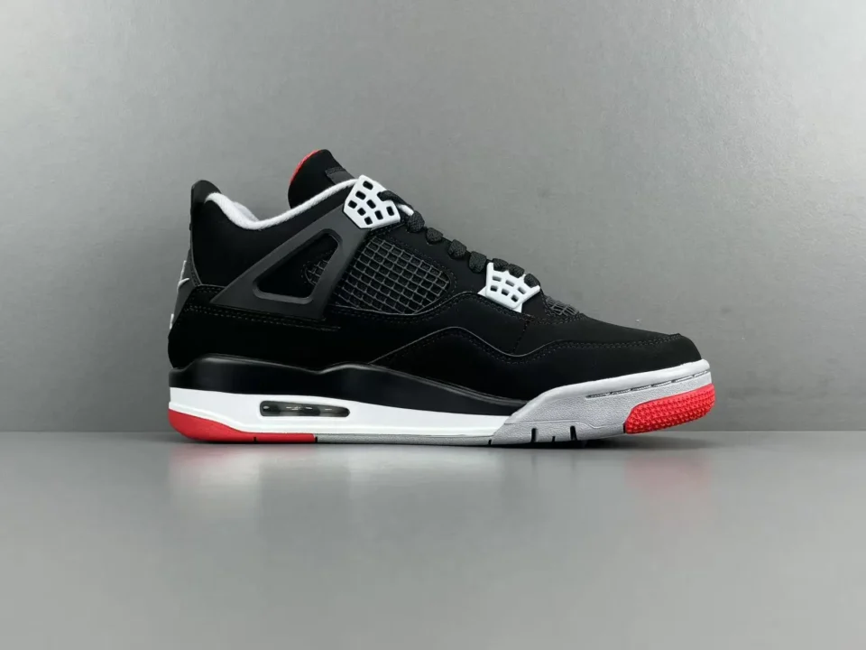 Nike Air Jordan 4 Retro Black Red White nubuck sneakers with mesh and rubber sole