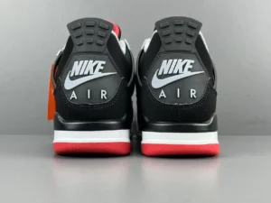 Nike Air Jordan 4 Retro Black Red White nubuck leather sneakers with iconic heel tab and branding