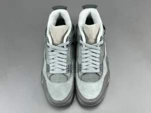 Air Jordan 4 Taupe Haze light grey suede sneakers with mesh panels and rubber sole