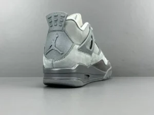 Nike Air Jordan 4 Cool Grey grey suede sneakers with rubber sole and signature Jumpman logo heel tab