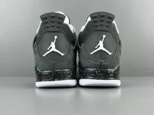 Nike Air Jordan 4 Retro black white speckled midsole suede sneakers back view