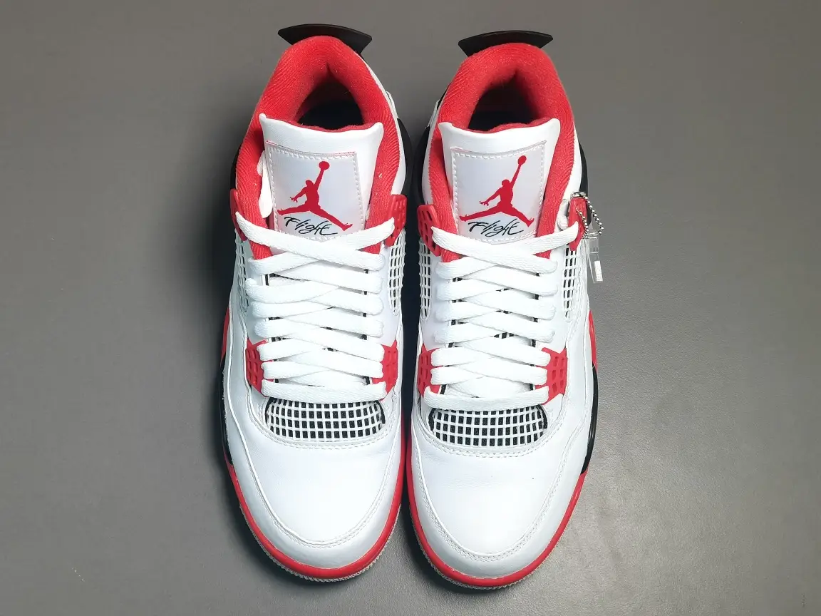 Nike Air Jordan 4 Fire Red white red black leather sneakers with mesh detailing