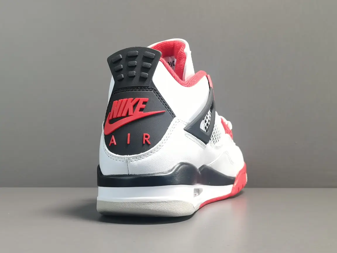 Nike Air Jordan 4 Fire Red white black cement gray leather sneakers with red lining and black accents