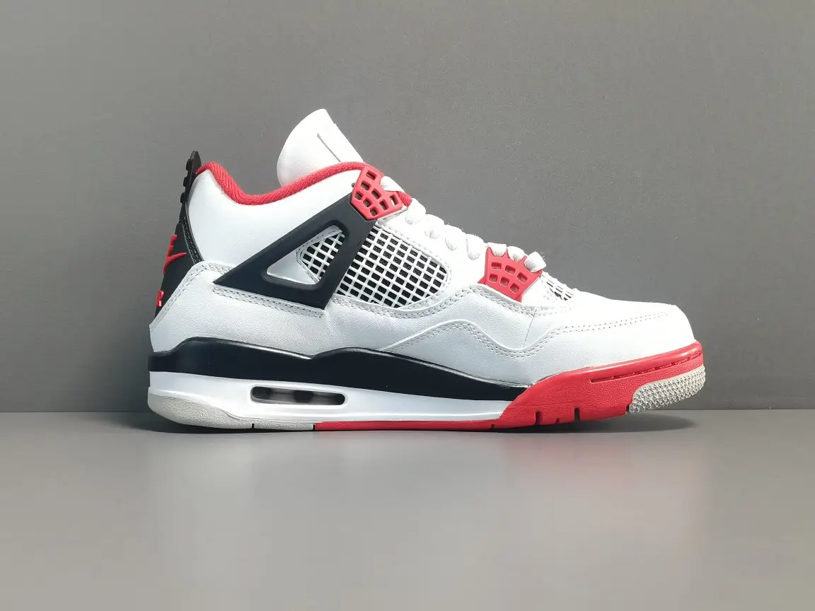 Nike Air Jordan 4 Fire Red white red black leather sneakers with mesh panels and air sole unit
