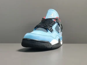 Ice Blue Travis Scott Cactus Jack x Air Jordan 4 sneaker with black and red accents, displayed at an angle on a neutral background.