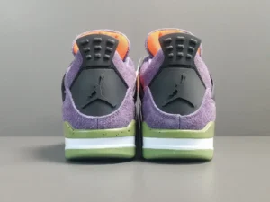 Back view of Air Jordan 4 Retro Canyon Purple sneakers showcasing purple suede upper, black heel tab with Jumpman logo, and green outsole.