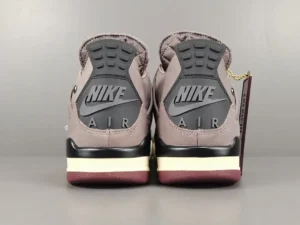 Nike Air branding on the heel of Jordan 4 Retro SP A Ma Maniére Violet Ore sneakers, showcasing premium craftsmanship and unique colorway.