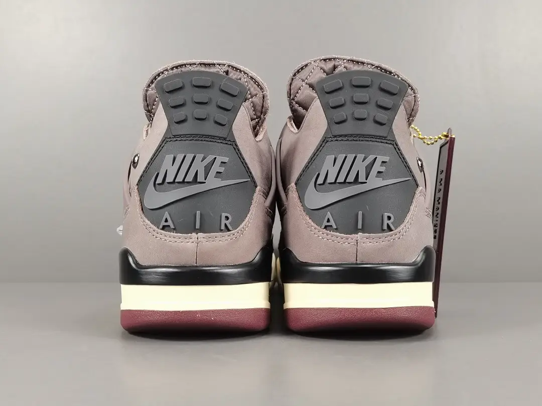 Nike Air branding on the back of Jordan 4 Retro SP A Ma Maniére Violet Ore sneakers, showcasing premium materials and craftsmanship.