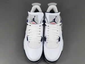 Nike Air Jordan 4 Retro military blue white leather sneakers with signature mesh panels and Jumpman logo