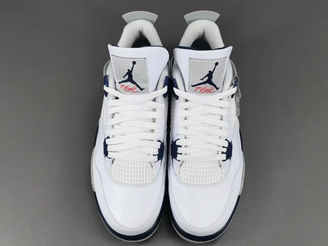 Nike Air Jordan 4 Retro military blue white leather sneakers with signature mesh panels and Jumpman logo